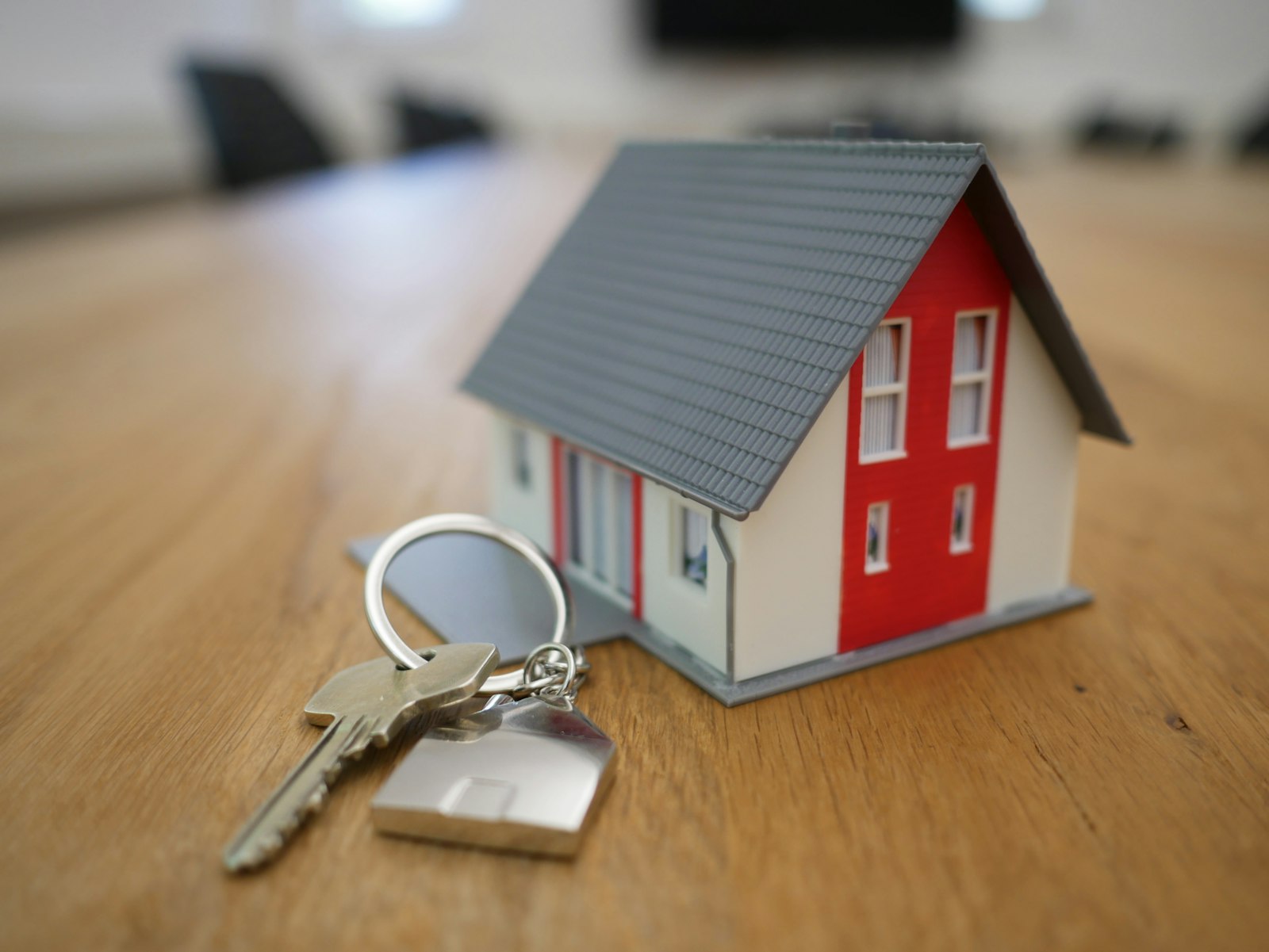 House keys resting on closing paperwork, representing the handover of a home in a cash sale