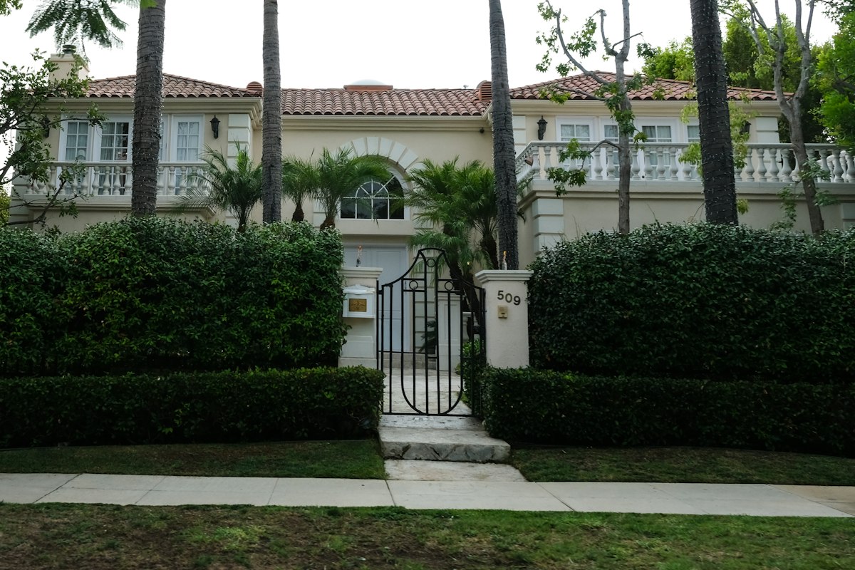Elegant Los Angeles house exterior with palm trees