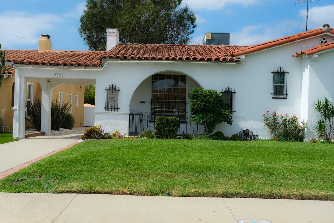 White stucco California house with a red tile roof