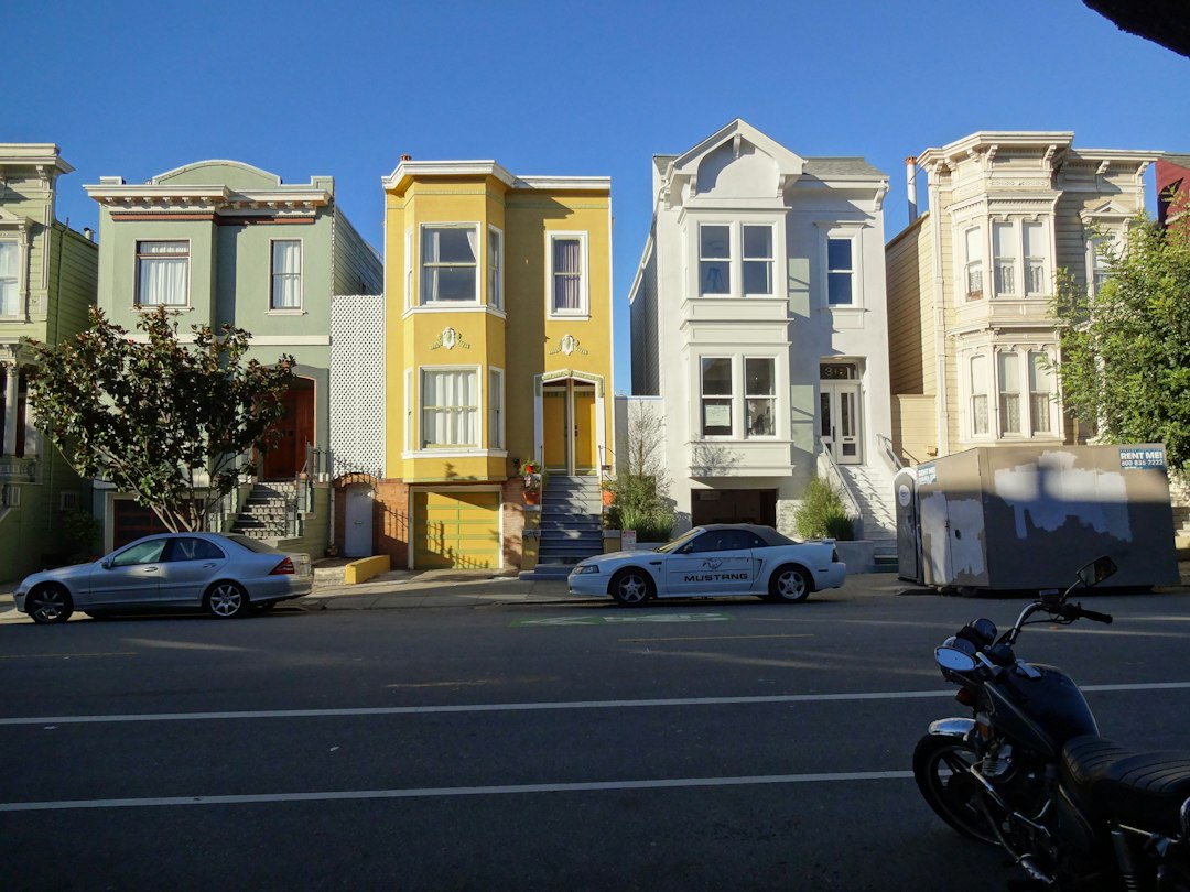 What Alameda's Relocation Payment Schedule Costs a Landlord Selling With Tenants in Place 1 Row of homes on a residential street in Alameda, California, where the city's rent program covers most rental housing